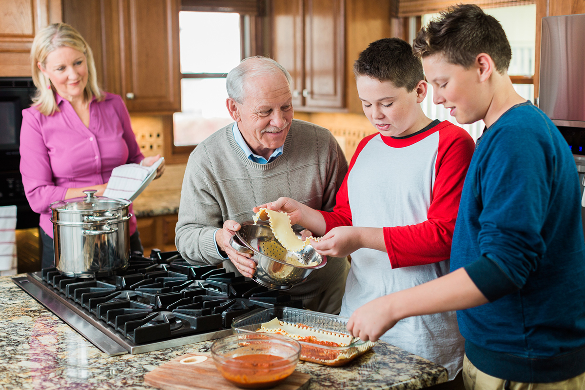 Family cooking dinner together.